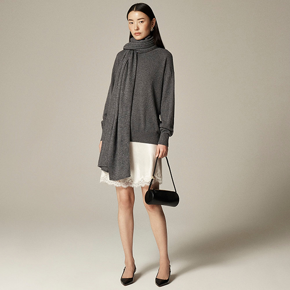 Large travel scarf that doubles as a blanket on airplanes